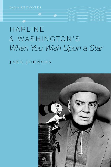 „HARLINE & WASHINGTON'S When You Wish Upon a Star“ von Jake Johnson. Schwarz-weißes Foto eines Mannes mit Hut und Mikrofon.