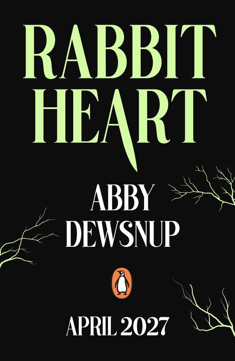 "RABBIT HEART", "ABBY DEWSNUP", "APRIL 2027" in hellgrüner Schrift auf schwarzem Hintergrund, mit Ästen und Pinguin-Logo.