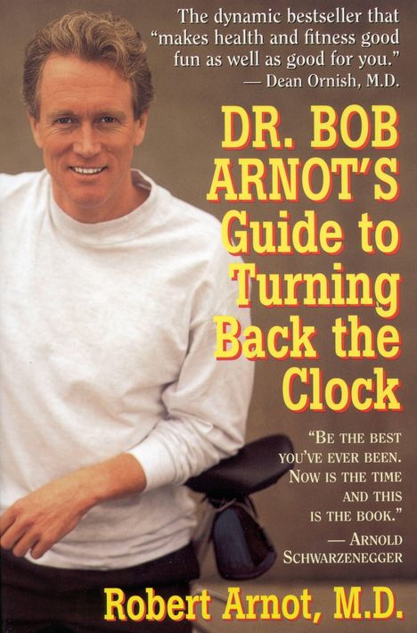 Titel: „DR. BOB ARNOT'S Guide to Turning Back the Clock.“ Mann in weißem Pullover lächelt und hält ein Fahrrad.