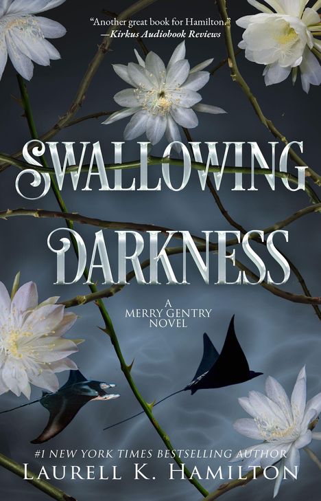 „Swallowing Darkness“, ein Roman von Laurell K. Hamilton. Weiße Blüten über Dornenzweigen auf dunklem Hintergrund.
