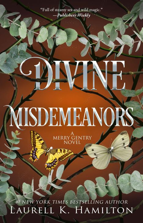 Text: "Divine Misdemeanors", "A Merry Gentry Novel", "Laurell K. Hamilton". Zwei Schmetterlinge vor Eukalyptusblättern.