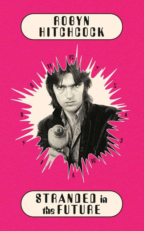 "Robyn Hitchcock", "Stranded in the Future", schwarz-weißes Foto einer Person mit Spielzeugpistole auf pinkem Hintergrund.