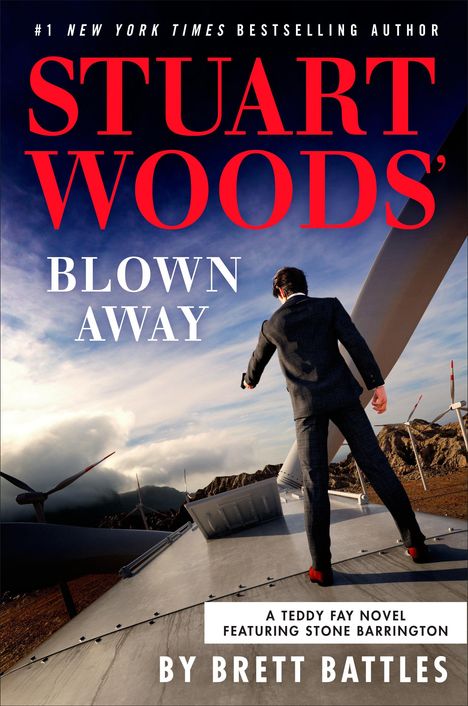 "STUART WOODS' BLOWN AWAY. A Teddy Fay Novel Featuring Stone Barrington by Brett Battles."  
Ein Mann steht auf einer Windturbine.