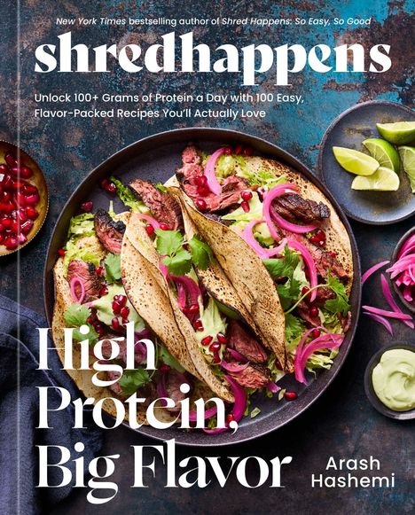 „shredhappens“, „High Protein, Big Flavor“. Tacos mit Fleisch, Avocado, roten Zwiebeln und Granatapfelkernen auf einem Teller.