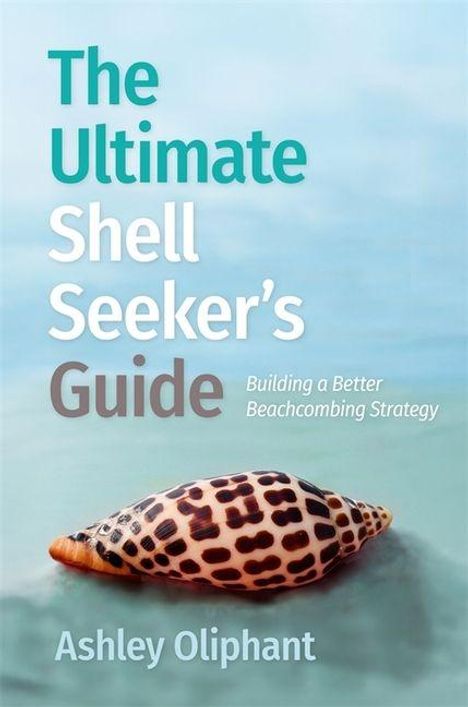 "The Ultimate Shell Seeker’s Guide: Building a Better Beachcombing Strategy" von Ashley Oliphant. Muschel auf Sand.