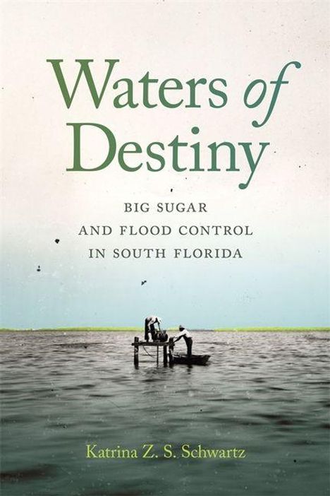 Texte: "Waters of Destiny", "Big Sugar and Flood Control in South Florida", "Katrina Z. S. Schwartz".  
Ein Tisch im Wasser.