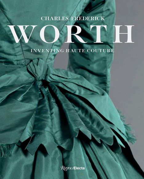 "Charles Frederick Worth: Inventing Haute Couture." Ein elegantes, grünes Kleid mit aufwendigen Falten und Schleife.