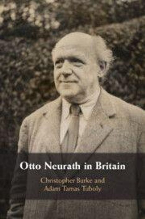 "Otto Neurath in Britain" von Christopher Burke und Adam Tamas Tuboly. Ein Mann in Anzug vor einem Busch.