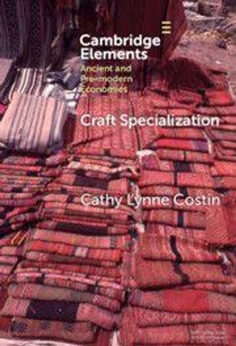 Texte: "Cambridge Elements", "Craft Specialization", "Cathy Lynne Costin". Hintergrund: Rote, gemusterte Stoffe.