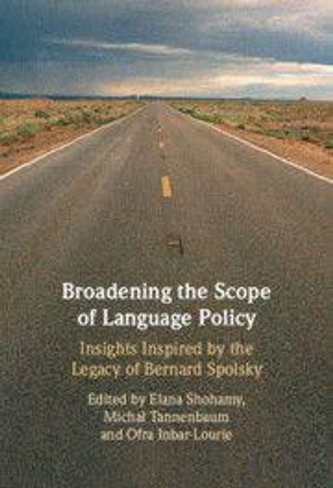 „Broadening the Scope of Language Policy“ steht über einem Highway in einer Landschaft.