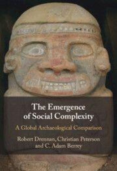 "The Emergence of Social Complexity: A Global Archaeological Comparison" von Robert Drennan, Christian Peterson und C. Adam Berrey.  
Ein antikes Steingesicht.
