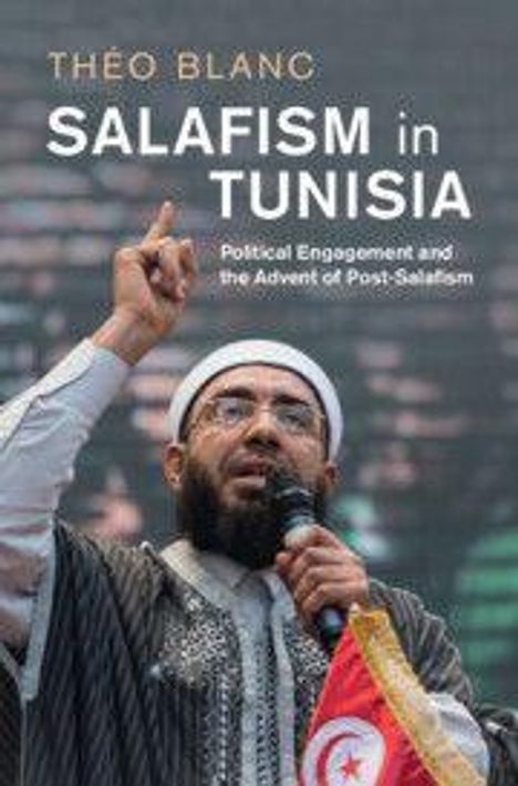 "Théo Blanc, Salafism in Tunisia: Political Engagement and the Advent of Post-Salafism." Ein Redner mit Mikrofon und Flagge.