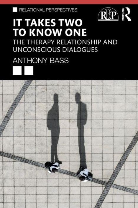 "IT TAKES TWO TO KNOW ONE - THE THERAPY RELATIONSHIP AND UNCONSCIOUS DIALOGUES - ANTHONY BASS." Zwei Personen auf Pflastersteinen.