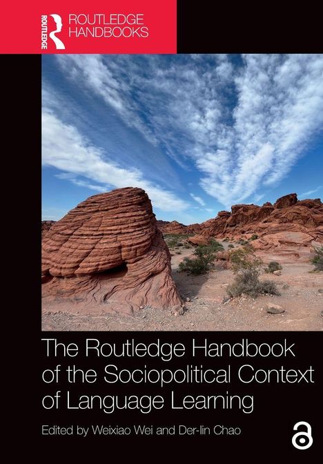 Text: "The Routledge Handbook of the Sociopolitical Context of Language Learning." 
Ein wüstenartiger Felsen unter wolkigem Himmel.
