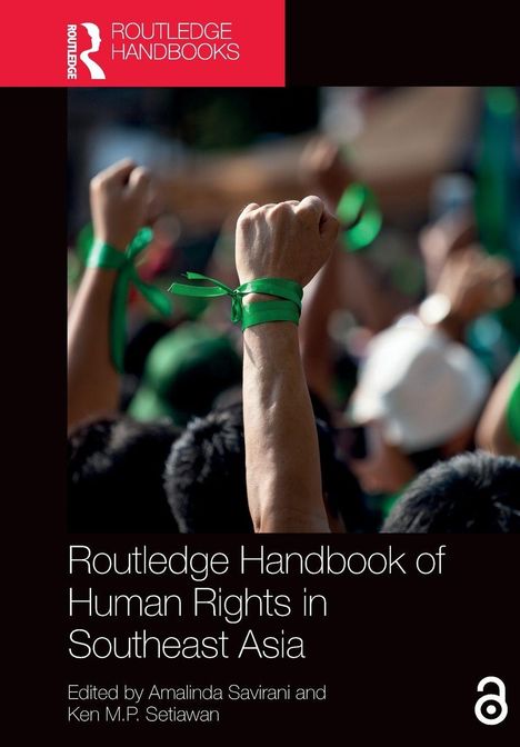 "Routledge Handbook of Human Rights in Southeast Asia." Fäuste mit grünen Bändern erhoben.