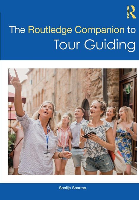 Buchtitel: "The Routledge Companion to Tour Guiding". Eine Frau zeigt einer fröhlichen Touristengruppe etwas.