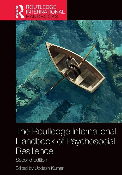 "The Routledge International Handbook of Psychosocial Resilience, Second Edition, Edited by Updesh Kumar." Ein Ruderboot auf klarem Wasser.
