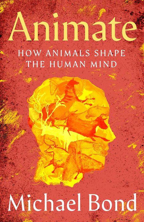 "Animate: How Animals Shape the Human Mind" von Michael Bond. Silhouetten von Tieren bilden ein menschliches Profil auf rotem Hintergrund.