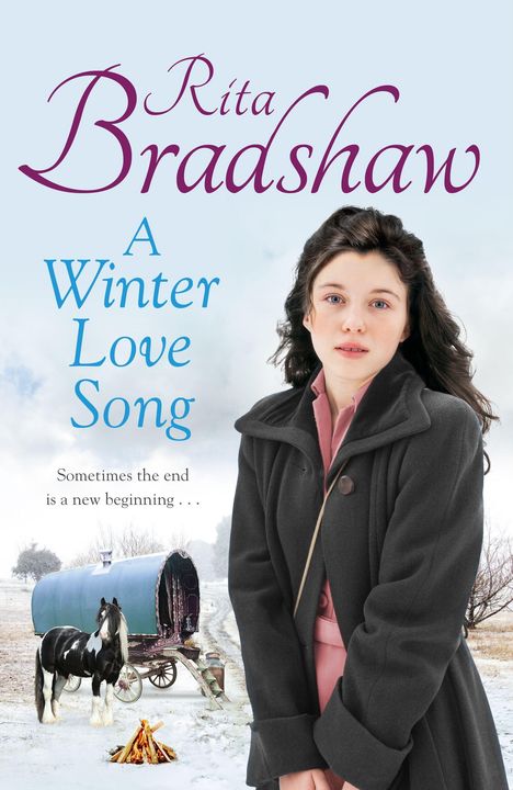 "Rita Bradshaw: A Winter Love Song. Sometimes the end is a new beginning..." Frau in Winterlandschaft neben Planwagen und Pferd.