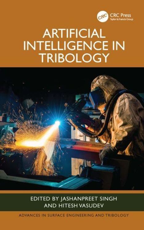 "Artificial Intelligence in Tribology" ist das Thema. Ein Arbeiter schweißt und funkensprüht in einer Werkstatt.