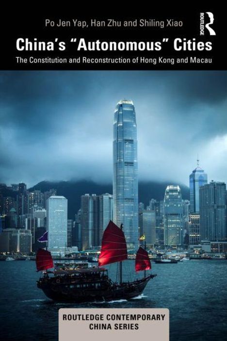 Titel: China's "Autonomous" Cities. Darunter Hongkongs Skyline bei Dämmerung mit einer traditionellen Dschunke im Vordergrund.