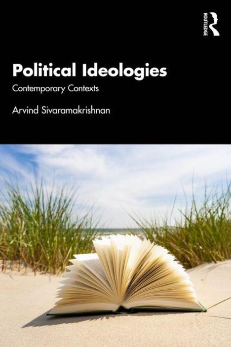 "Political Ideologies", "Contemporary Contexts", Arvind Sivaramakrishnan. Ein geöffnetes Buch liegt im Gras vor einem Strand.