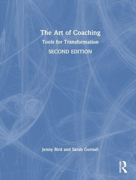 "The Art of Coaching: Tools for Transformation, SECOND EDITION, Jenny Bird and Sarah Gornall." Blaue, abstrakte Linien als Hintergrund.