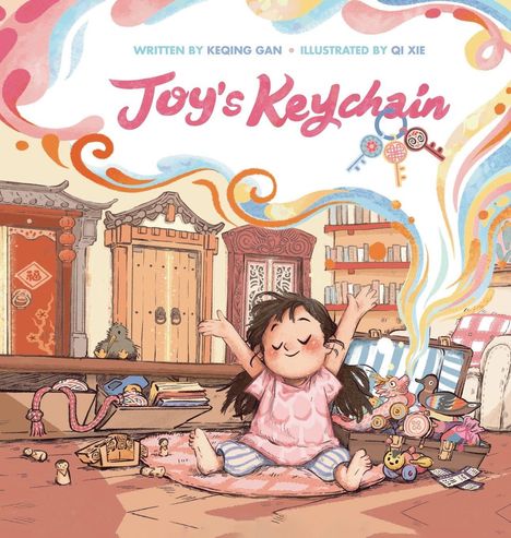 "Joy's Keychain", verfasst von Keqing Gan, illustriert von Qi Xie. Ein fröhliches Mädchen sitzt mit Spielzeugen umgeben.