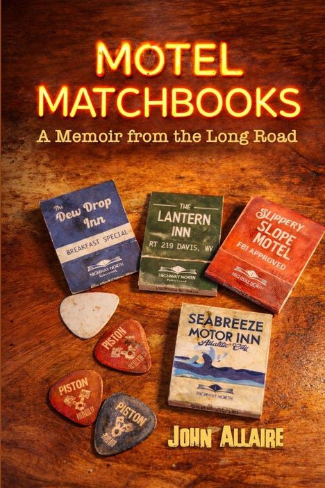 "MOTEL MATCHBOOKS, A Memoir from the Long Road, John Allaire." Verschiedene Streichholzschachteln und Plektren auf Holz.