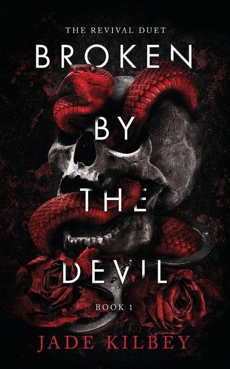 „The Revival Duet. Broken by the Devil. Book 1. Jade Kilbey“  
Ein Schädel, roter Schlangen, rote Rosen.