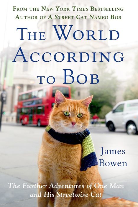 "The World According to Bob"; Autor: James Bowen. Eine orange Katze mit Schal, im Hintergrund ein roter Bus.