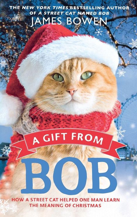 Ein Buchcover zeigt eine Katze mit Weihnachtsmütze und Schal. Text: "A Gift From Bob" von James Bowen.