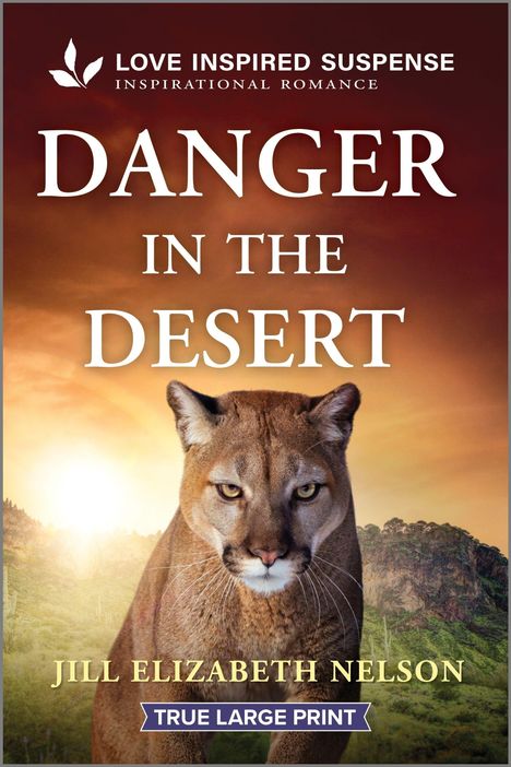 "Danger in the Desert" steht groß im Zentrum. Darunter eine Illustration eines Pumas in einer Wüstenlandschaft bei Sonnenuntergang.