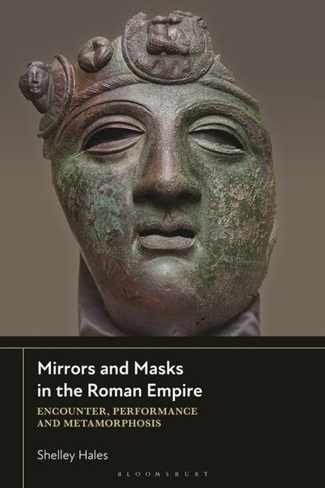 "Mirrors and Masks in the Roman Empire" von Shelley Hales. Eine antike Maske mit kunstvollen Details.