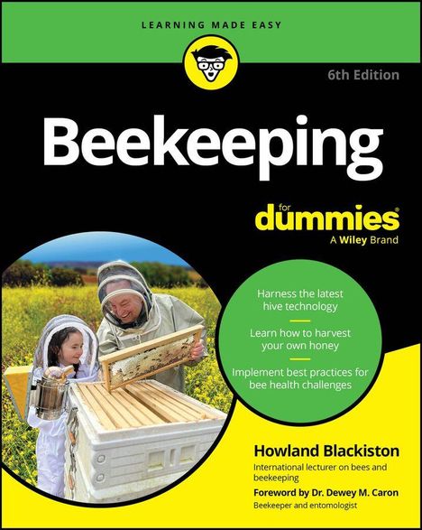 „Beekeeping for dummies“ auf Buchcover. Zwei Imker:innen in Schutzkleidung vor blühendem Feld neben Bienenstock.