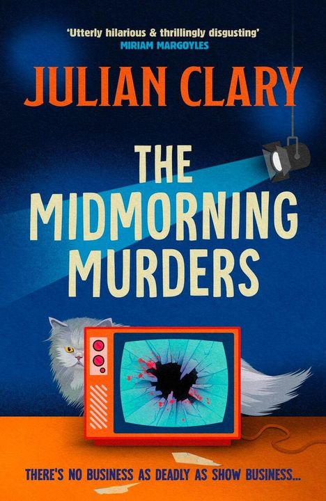 "Julian Clary, The Midmorning Murders". Eine Katze hinter einem zerbrochenen Fernsehbildschirm, ein Scheinwerfer strahlt.