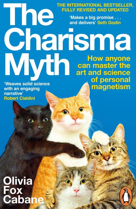 "The Charisma Myth" Buchcover mit vier Katzen in verschiedenen Farben vor blauem Hintergrund.