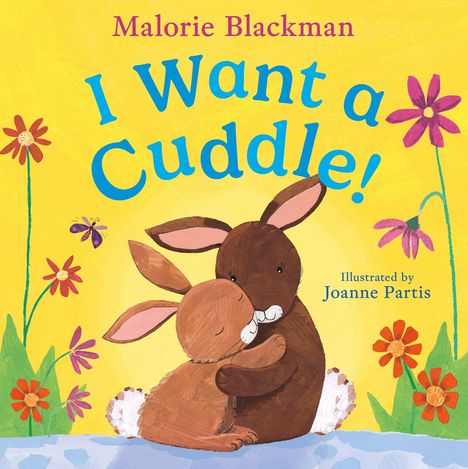 Text: "Malorie Blackman I Want a Cuddle! Illustrated by Joanne Partis." Zwei Hasen umarmen sich, umgeben von Blumen auf gelbem Hintergrund.