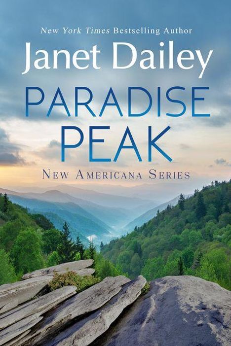 Text: "Janet Dailey, Paradise Peak, New Americana Series". Eine schöne Berglandschaft mit Bäumen und Felsen bei Sonnenuntergang.