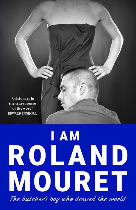 Text: "FINAL COVER TO BE REVEALED", "I Am Roland Mouret", "ROLAND MOURET". Logo: Quercus. Weiße Hintergrund mit rotem Rand.