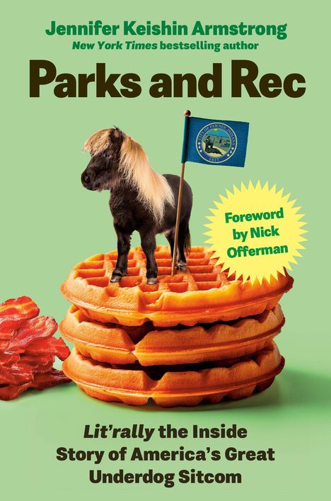 „Parks and Rec“ von Jennifer Keishin Armstrong. Ein Pony steht auf Waffeln mit einer kleinen Flagge.
