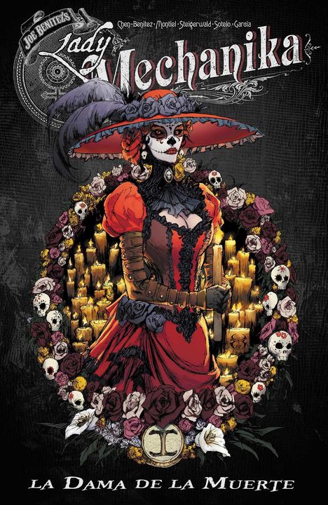 Text: "Lady Mechanika, La Dama de la Muerte." Illustration: Frau im roten Kleid, Totenkopfmaske, umgeben von Blumen, Kerzen.