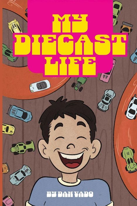 Text: "MY DIECAST LIFE" und "BY DAN VADO". Illustration mit fröhlichem Jungen und Miniaturautos auf Rennstrecken.
