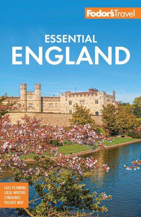 "Essential England" – Eine Burg am Fluss mit blühenden Bäumen im Vordergrund und einem klaren blauen Himmel.