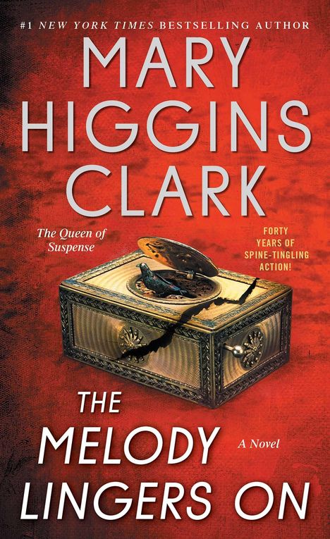 „Mary Higgins Clark: The Melody Lingers On“. Vintage-Schmuckschatulle vor rotem Hintergrund.