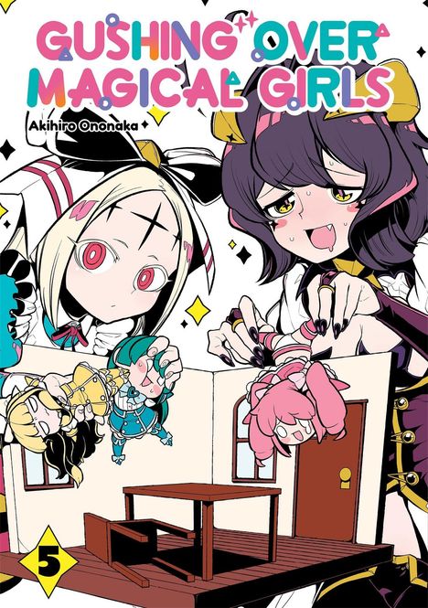 Der Text lautet „Gushing Over Magical Girls“. Zwei Charaktere halten kleine Figuren in einem Puppenhaus. Bunt und verspielt.