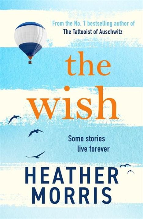 Text: "From the No. 1 bestselling author of The Tattooist of Auschwitz", "the wish", "Some stories live forever", "HEATHER MORRIS". Ein Heißluftballon fliegt über Vögel.