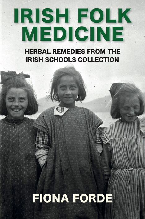 Überschrift: "Irish Folk Medicine". Drei lachende Mädchen in traditioneller Kleidung.