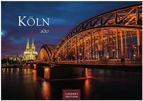 Text: Köln 2027. Nachtansicht einer beleuchteten Brücke und dem Dom im Hintergrund unter einem dunklen Himmel.