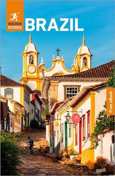 Text: "ROUGH GUIDES BRAZIL," "Free eBook." Eine malerische Straße mit Kopfsteinpflaster in einem historischen brasilianischen Ort.